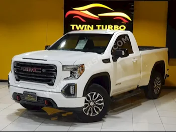 GMC  Sierra  AT4  2019  Automatic  155,000 Km  8 Cylinder  Four Wheel Drive (4WD)  Pick Up  White