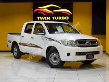 Toyota  Hilux  2009  Manual  132,000 Km  4 Cylinder  Four Wheel Drive (4WD)  Pick Up  White