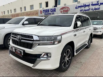 Toyota  Land Cruiser  GXR- Grand Touring  2021  Automatic  103,000 Km  6 Cylinder  Four Wheel Drive (4WD)  SUV  White