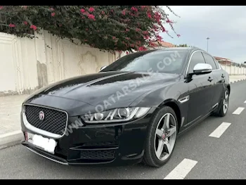 Jaguar  XE  Prestige  2019  Tiptronic  87,000 Km  4 Cylinder  Rear Wheel Drive (RWD)  Sedan  Black  With Warranty