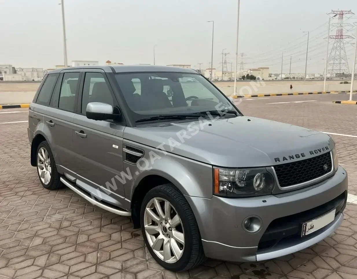 Land Rover  Range Rover  Sport Super charged  2012  Automatic  169,000 Km  8 Cylinder  Four Wheel Drive (4WD)  SUV  White and Gray