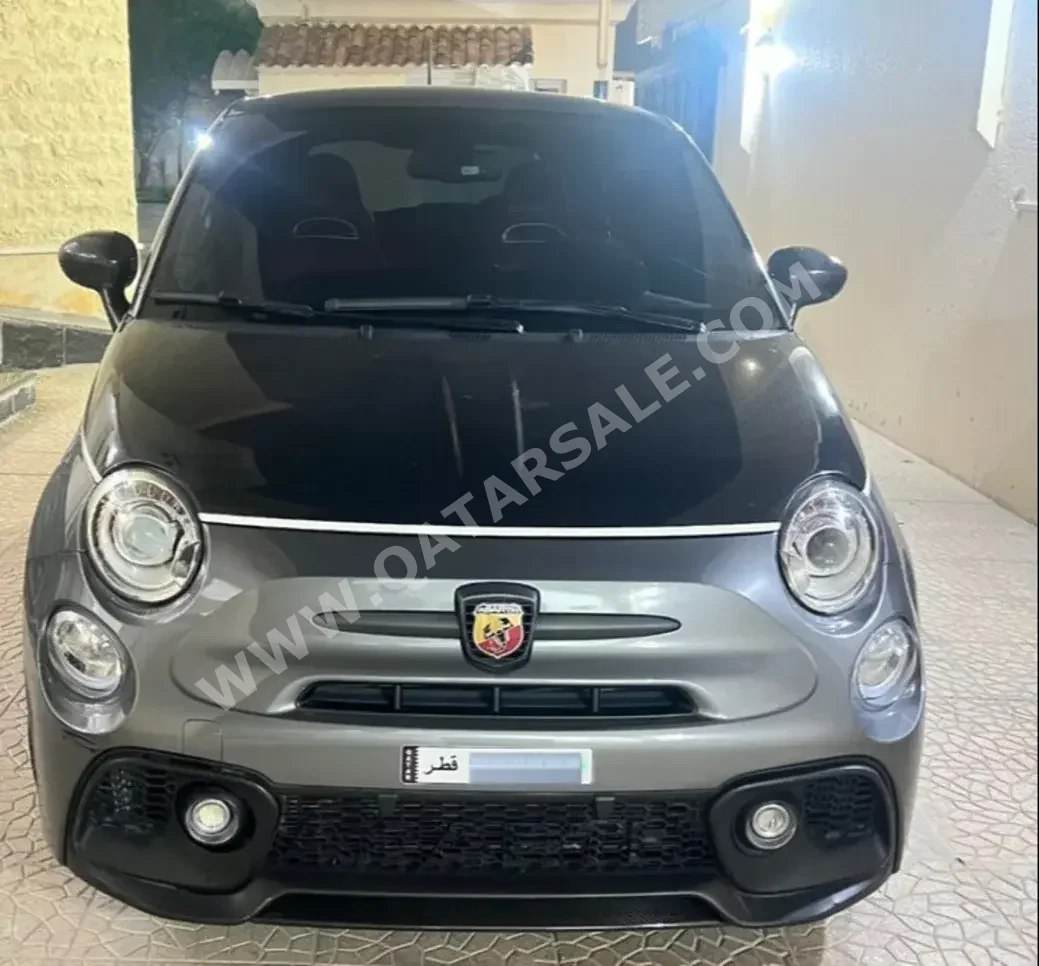 Fiat  595  Abarth  2021  Automatic  29,252 Km  4 Cylinder  Front Wheel Drive (FWD)  Hatchback  Gray and Black  With Warranty