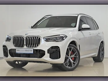 BMW  X-Series  X5 40i  2022  Automatic  26,650 Km  6 Cylinder  All Wheel Drive (AWD)  SUV  White  With Warranty