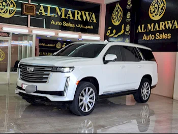 Cadillac  Escalade  Platinum  2021  Automatic  37,000 Km  8 Cylinder  Four Wheel Drive (4WD)  SUV  White  With Warranty