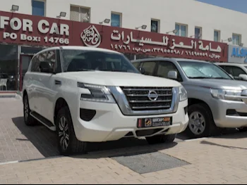 Nissan  Patrol  XE  2021  Automatic  74,000 Km  6 Cylinder  Four Wheel Drive (4WD)  SUV  White  With Warranty