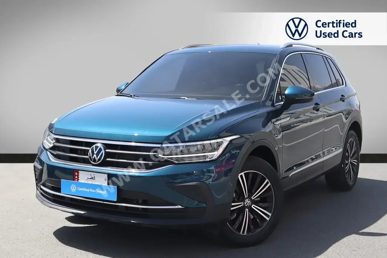 Volkswagen  Tiguan  2.0 TSI  2023  Automatic  7,600 Km  4 Cylinder  All Wheel Drive (AWD)  SUV  Blue  With Warranty