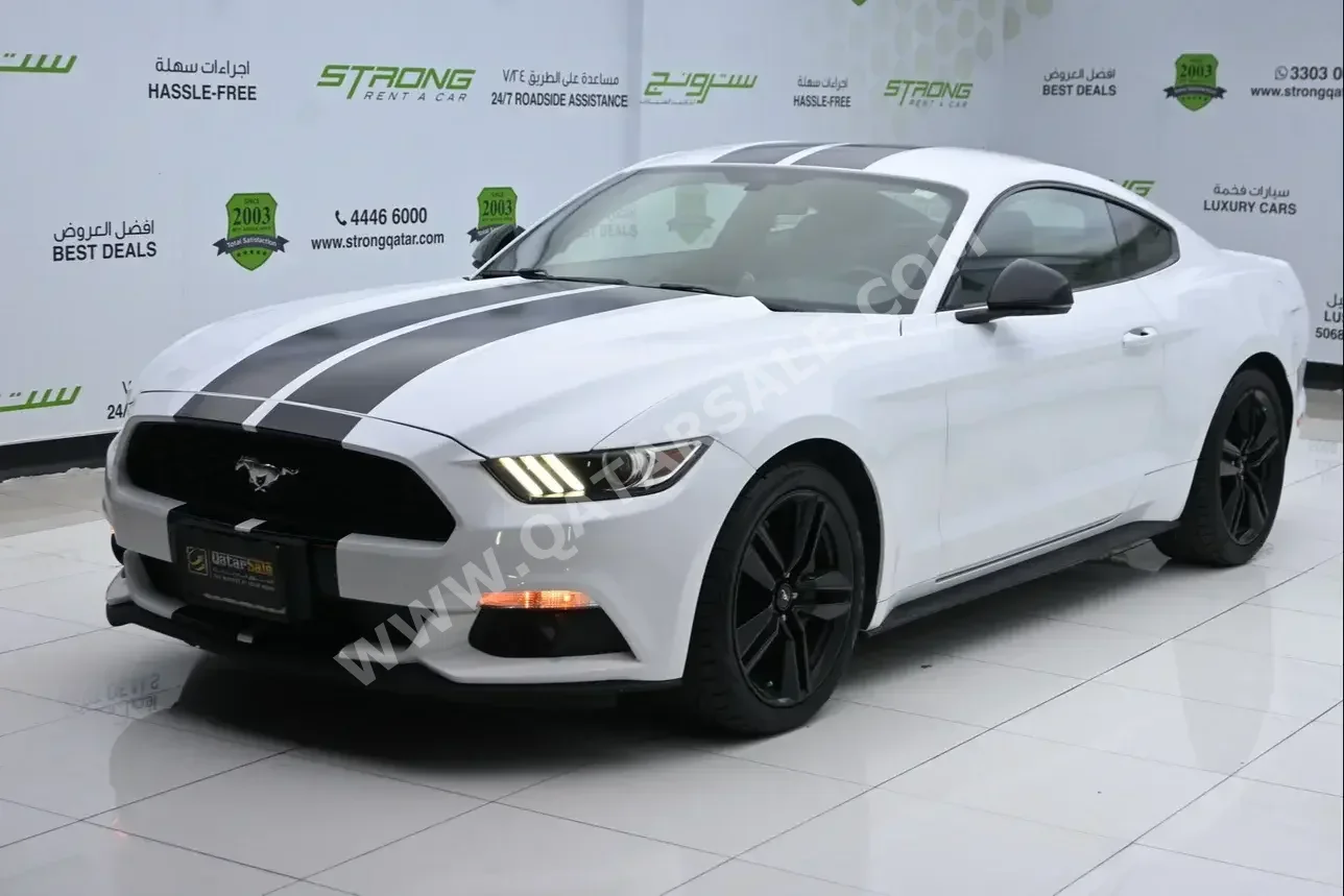 Ford  Mustang  Ecoboost  2015  Automatic  95,000 Km  4 Cylinder  Rear Wheel Drive (RWD)  Coupe / Sport  White