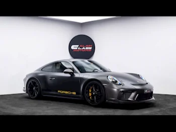 Porsche  911  GT3 Touring  2018  Automatic  14,081 Km  6 Cylinder  Rear Wheel Drive (RWD)  Coupe / Sport  Gray