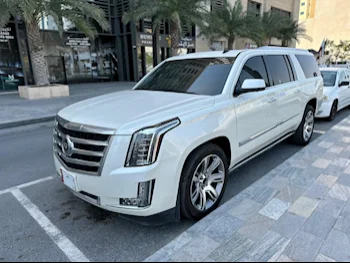 Cadillac  Escalade  2015  Automatic  199,000 Km  8 Cylinder  Four Wheel Drive (4WD)  SUV  White