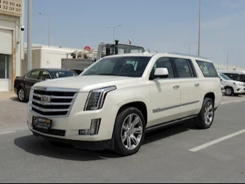 Cadillac  Escalade  2015  Automatic  115,000 Km  8 Cylinder  Four Wheel Drive (4WD)  SUV  White