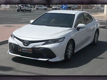 Toyota  Camry  LE  2019  Automatic  29,000 Km  4 Cylinder  Front Wheel Drive (FWD)  Sedan  White