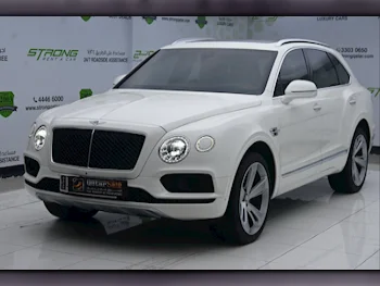  Bentley  Bentayga  2019  Automatic  73,000 Km  8 Cylinder  Four Wheel Drive (4WD)  SUV  White  With Warranty