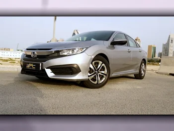 Honda  Civic  LXI  2016  Automatic  115,000 Km  4 Cylinder  Front Wheel Drive (FWD)  Sedan  Silver