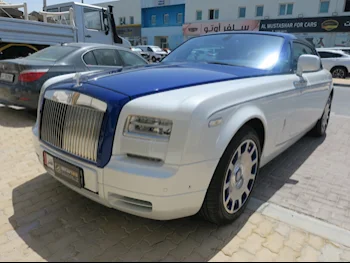 Rolls-Royce  Phantom  2016  Automatic  38,000 Km  12 Cylinder  All Wheel Drive (AWD)  Coupe / Sport  White and Blue