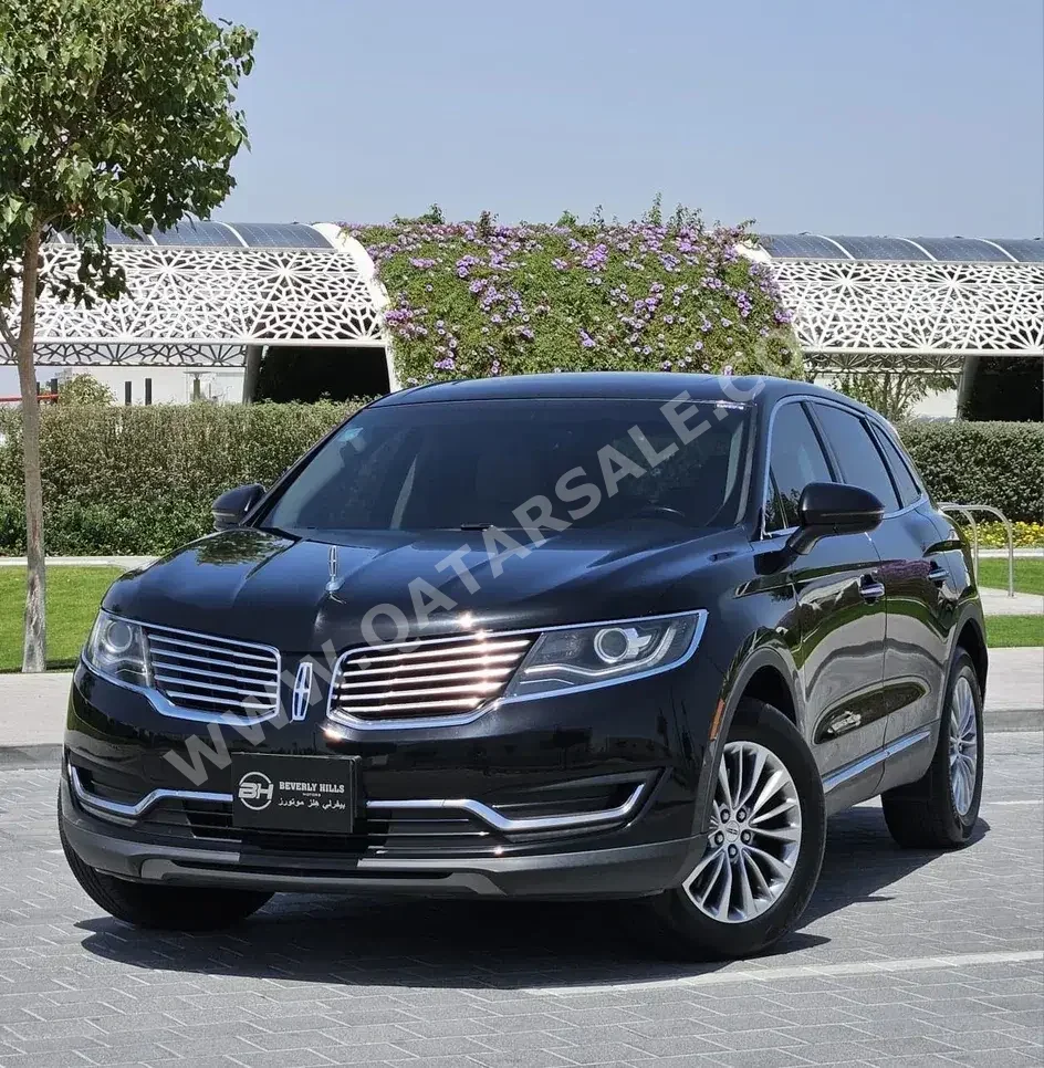 Lincoln  MKX  Select  2016  Automatic  61,197 Km  4 Cylinder  Four Wheel Drive (4WD)  SUV  Black  With Warranty