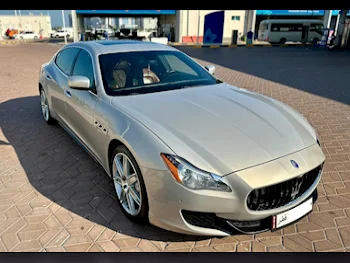 Maserati  Quattroporte  GTS  2014  Automatic  110,000 Km  8 Cylinder  Rear Wheel Drive (RWD)  Sedan  Gold