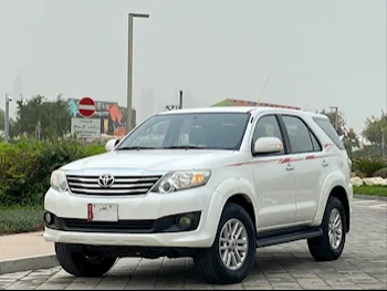 Toyota  Fortuner  SR5  2014  Automatic  281,000 Km  4 Cylinder  Four Wheel Drive (4WD)  SUV  White
