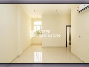 3 Bedrooms  Apartment  For Rent  in Doha -  Nuaija  Not Furnished