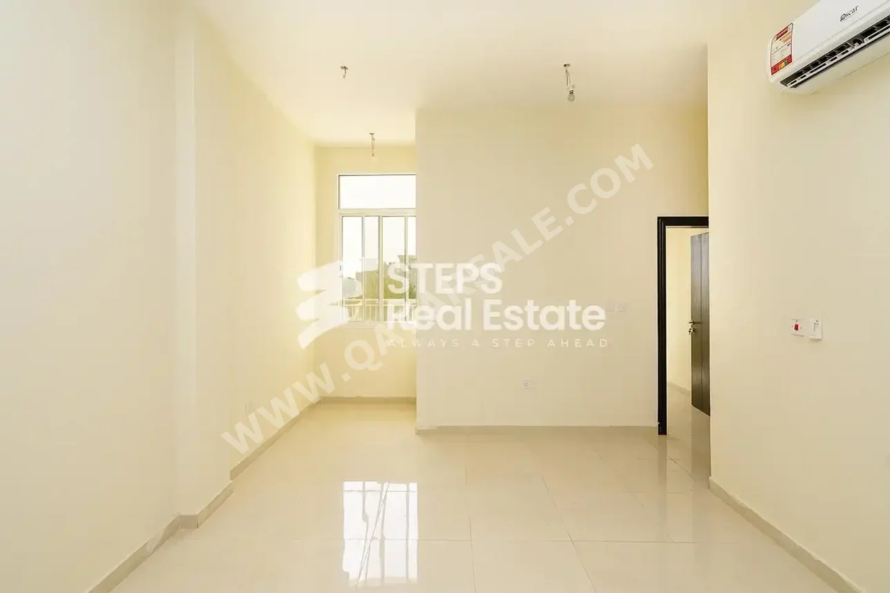 3 Bedrooms  Apartment  For Rent  in Doha -  Nuaija  Not Furnished