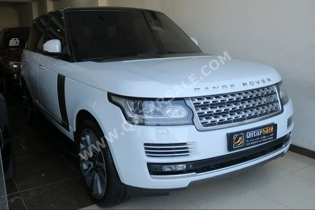 Land Rover  Range Rover  Vogue  Autobiography  2014  Automatic  122,000 Km  8 Cylinder  Four Wheel Drive (4WD)  SUV  White