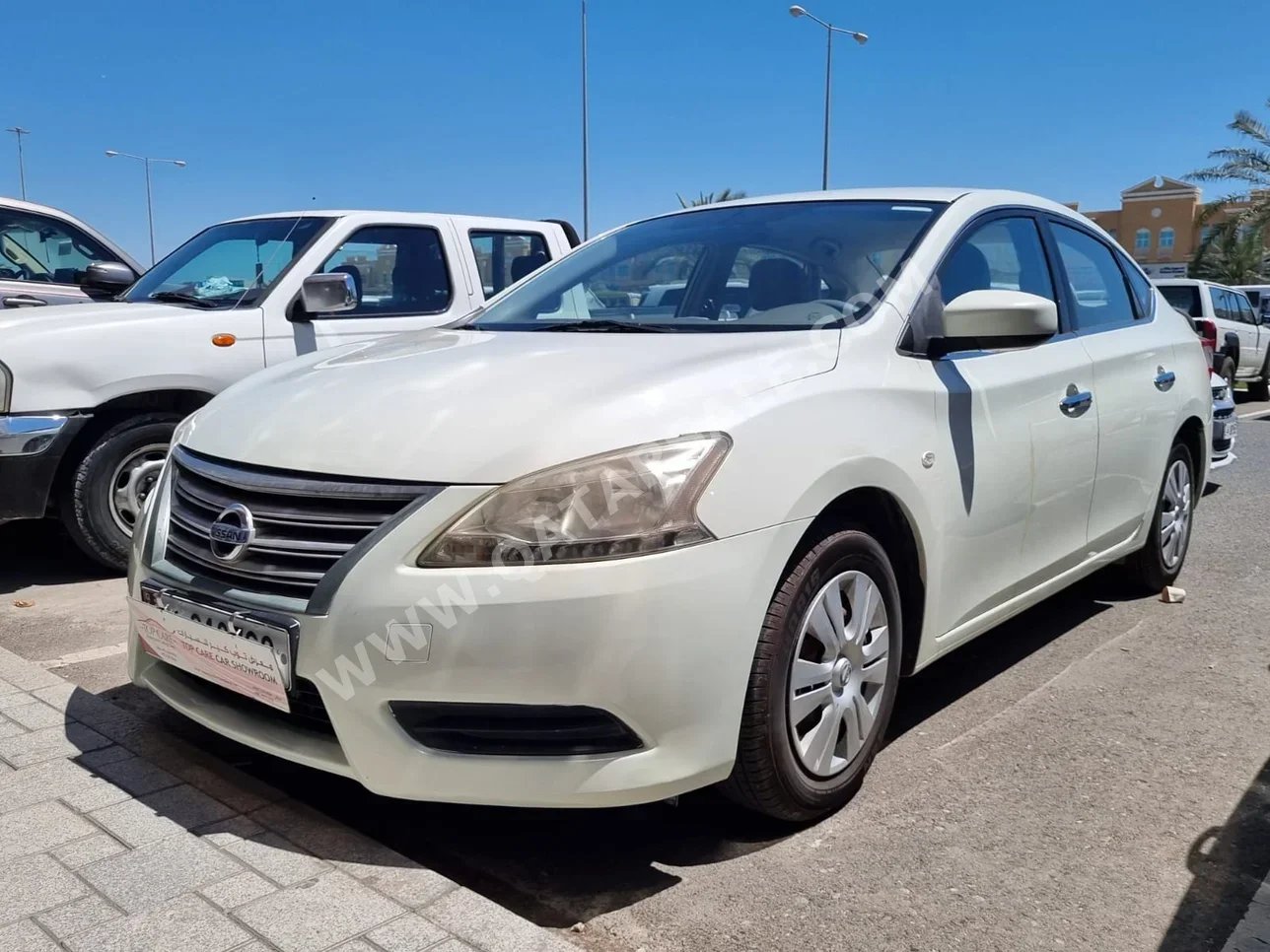  Nissan  Sentra  2014  Automatic  100,000 Km  4 Cylinder  Front Wheel Drive (FWD)  Sedan  White  With Warranty