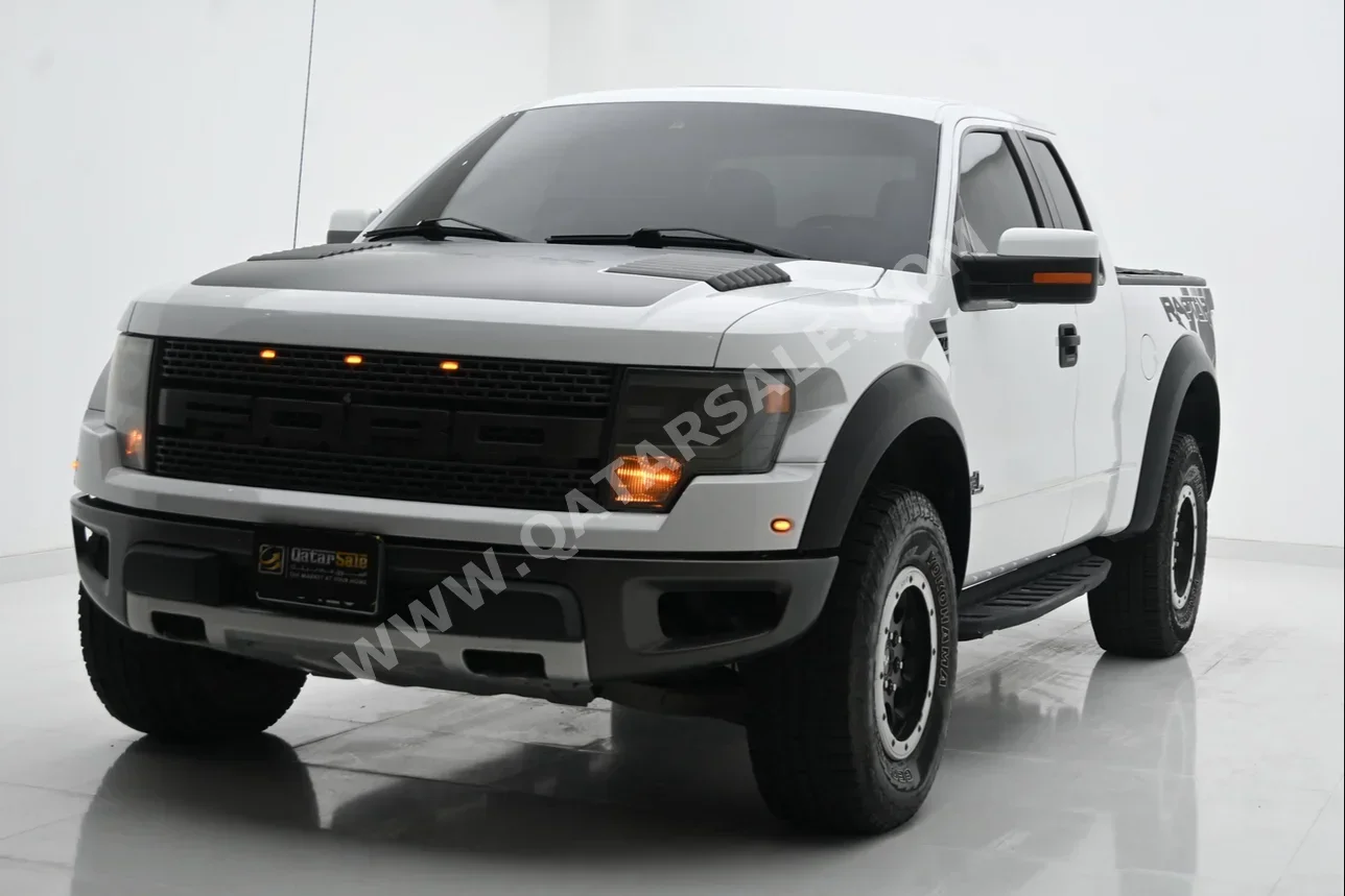 Ford  Raptor  2014  Automatic  202,000 Km  8 Cylinder  Four Wheel Drive (4WD)  Pick Up  White  With Warranty