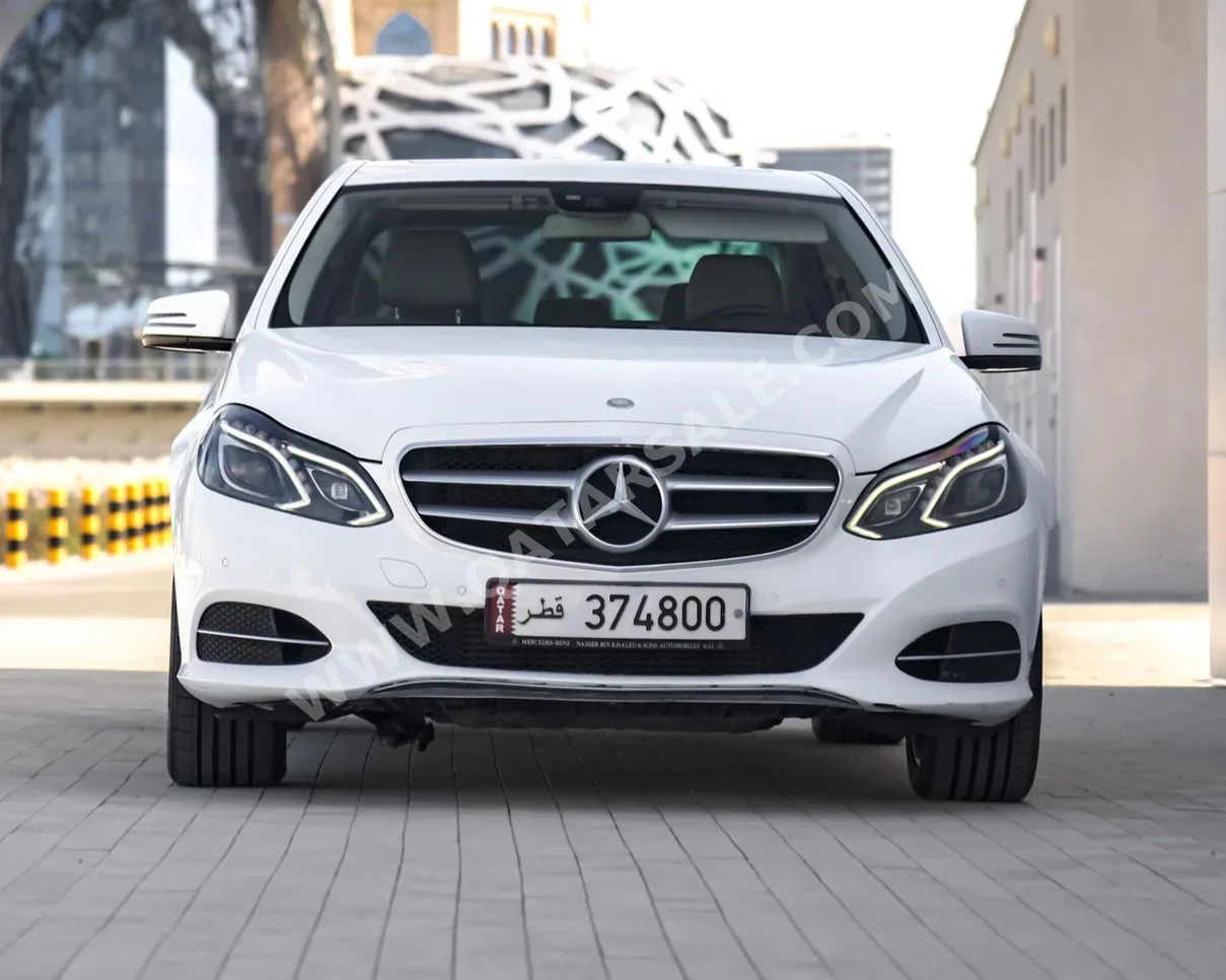 Mercedes-Benz  E-Class  200  2016  Automatic  78,000 Km  4 Cylinder  Rear Wheel Drive (RWD)  Sedan  White