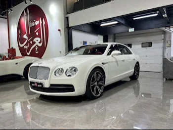 Bentley  Continental  Flying Spur  2015  Automatic  35,000 Km  8 Cylinder  All Wheel Drive (AWD)  Sedan  White
