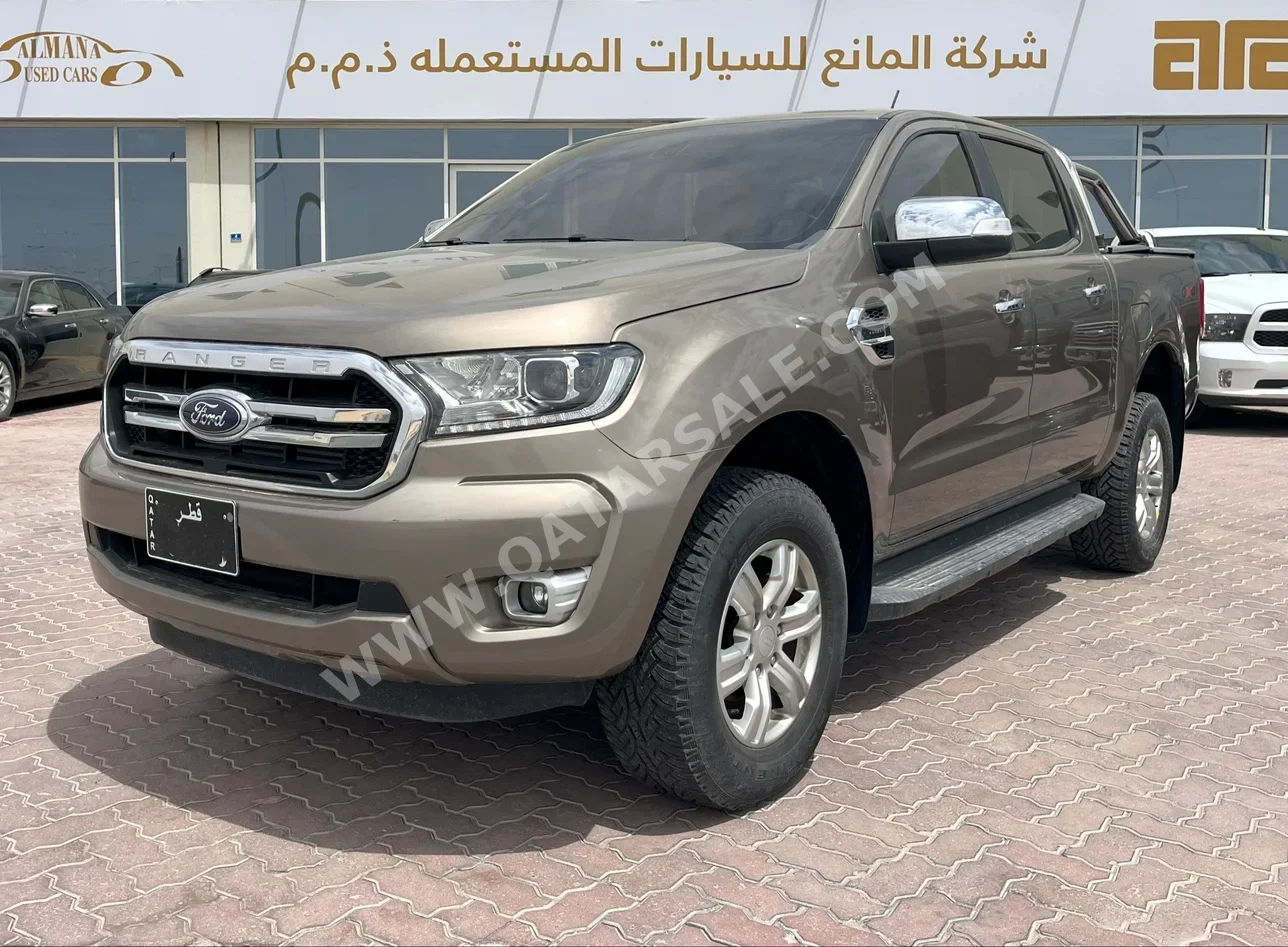 Ford  Ranger  XLT  2022  Automatic  55,000 Km  4 Cylinder  Four Wheel Drive (4WD)  Pick Up  Beige  With Warranty