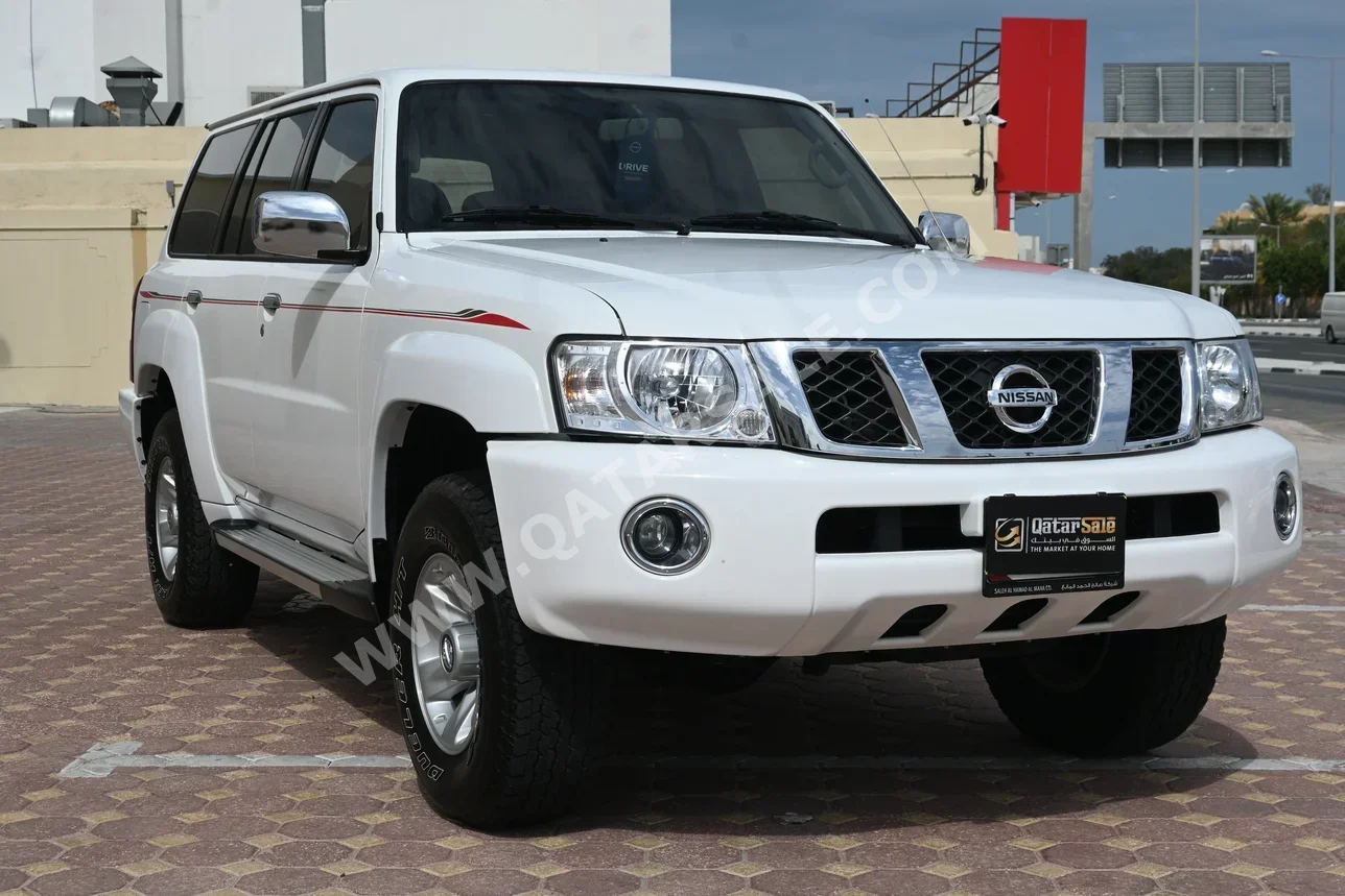 Nissan  Patrol  Safari  2022  Automatic  15,000 Km  6 Cylinder  Four Wheel Drive (4WD)  SUV  White  With Warranty