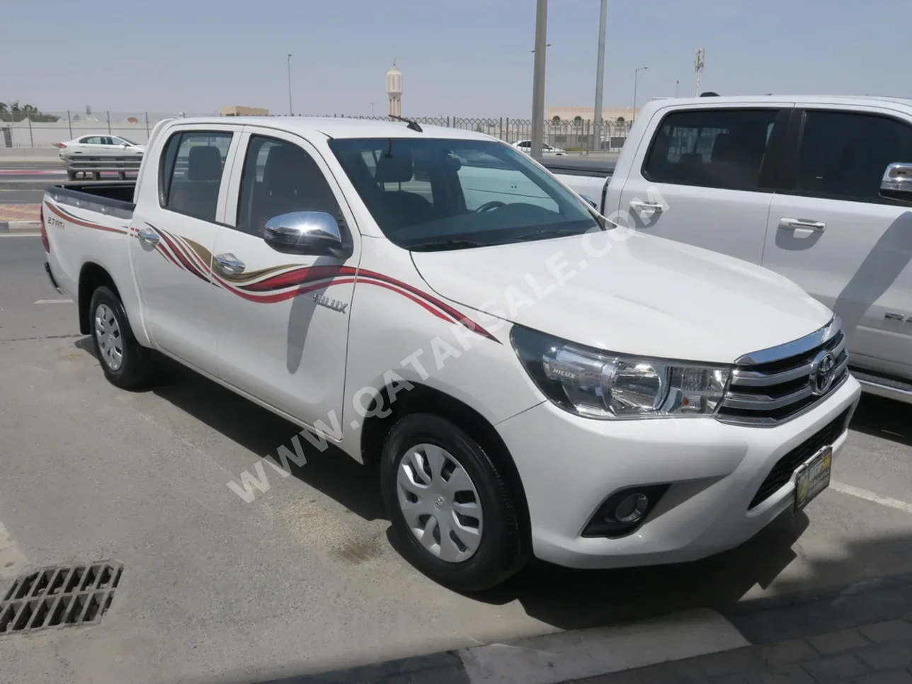 Toyota  Hilux  2021  Automatic  57,000 Km  4 Cylinder  Rear Wheel Drive (RWD)  Pick Up  White