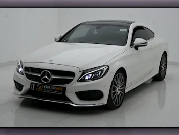 Mercedes-Benz  C-Class  300  2016  Automatic  145,000 Km  4 Cylinder  Rear Wheel Drive (RWD)  Coupe / Sport  White