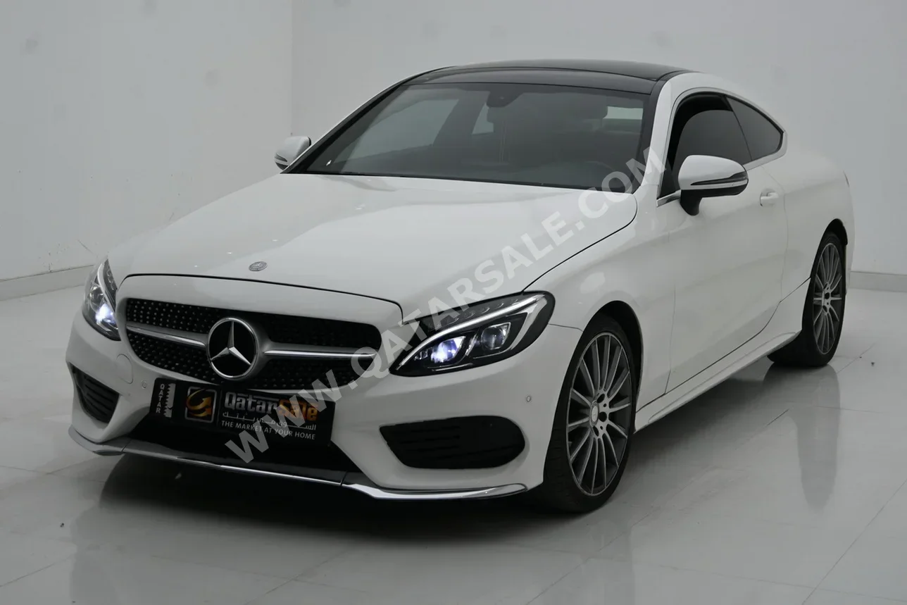 Mercedes-Benz  C-Class  300  2016  Automatic  145,000 Km  4 Cylinder  Rear Wheel Drive (RWD)  Coupe / Sport  White