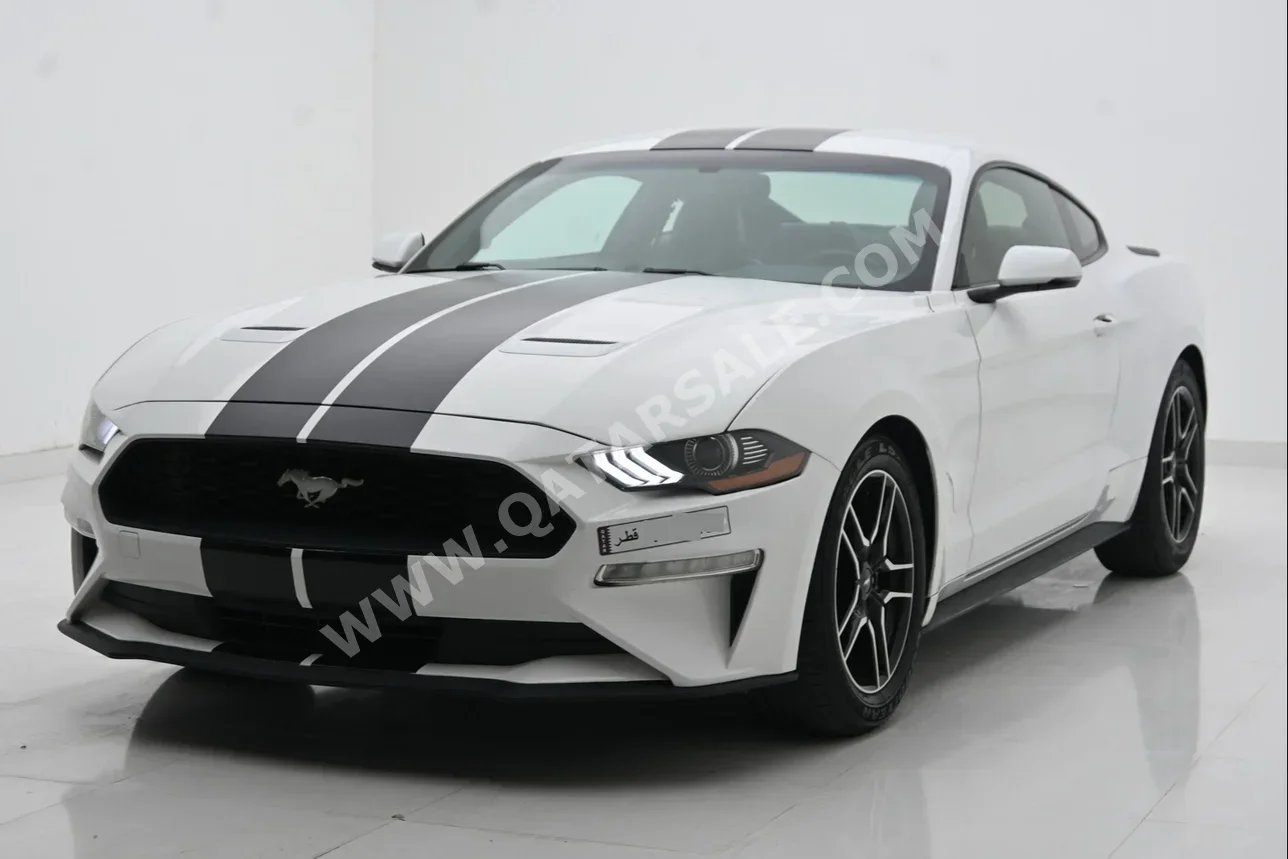 Ford  Mustang  Ecoboost  2019  Automatic  103,000 Km  4 Cylinder  Rear Wheel Drive (RWD)  Coupe / Sport  White