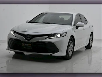Toyota  Camry  Hybrid  2019  Automatic  158,000 Km  4 Cylinder  Front Wheel Drive (FWD)  Sedan  White