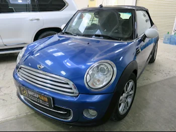 Mini  Cooper  2014  Automatic  88,000 Km  4 Cylinder  Front Wheel Drive (FWD)  Convertible  Blue
