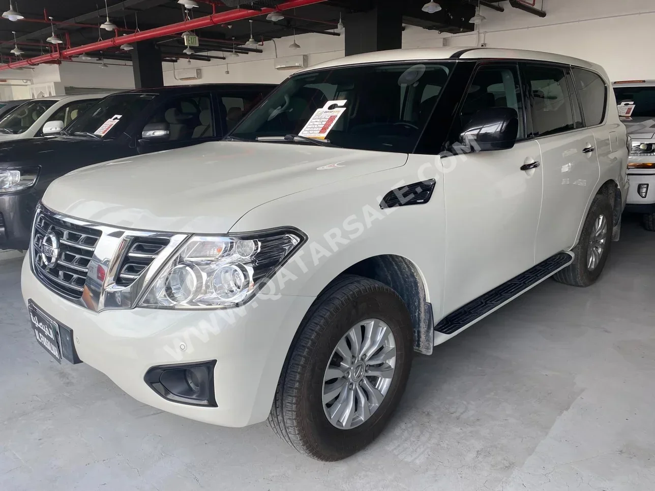 Nissan  Patrol  XE  2019  Automatic  118,000 Km  6 Cylinder  Four Wheel Drive (4WD)  SUV  White