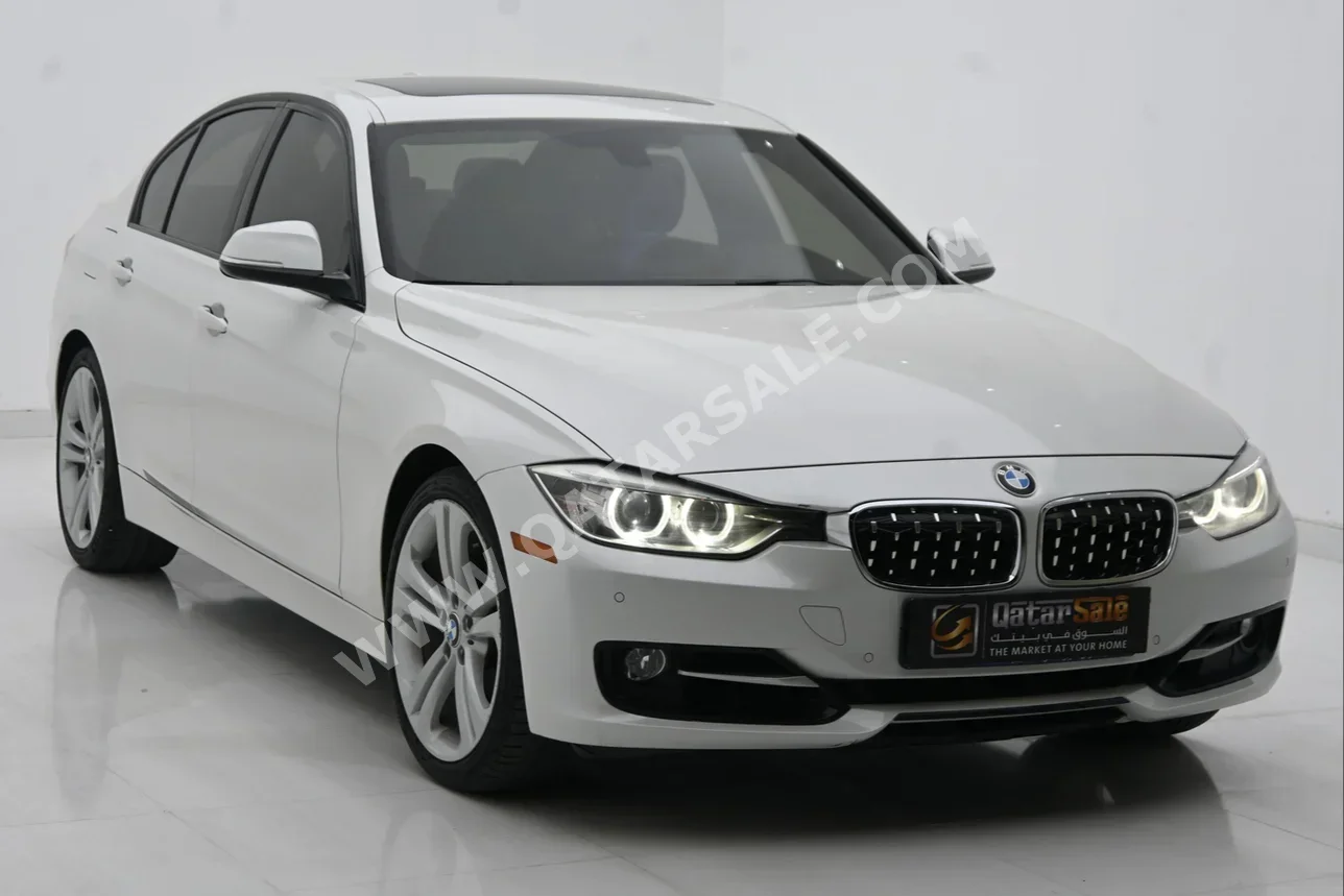  BMW  3-Series  328i  2014  Automatic  93,000 Km  4 Cylinder  Rear Wheel Drive (RWD)  Sedan  White  With Warranty