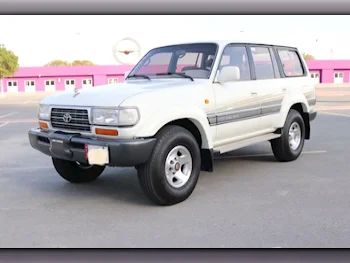 Toyota  Land Cruiser  VXR  1996  Automatic  348,000 Km  6 Cylinder  Four Wheel Drive (4WD)  SUV  White