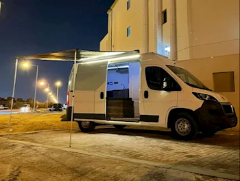 Caravan 2017  White Made in Qatar  1,000 Km