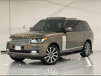 Land Rover  Range Rover  Vogue  Autobiography  2014  Automatic  77,000 Km  8 Cylinder  Four Wheel Drive (4WD)  SUV  Brown
