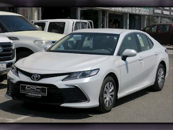 Toyota  Camry  LE  2024  Automatic  700 Km  4 Cylinder  Front Wheel Drive (FWD)  Sedan  White  With Warranty