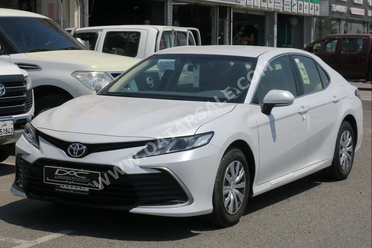 Toyota  Camry  LE  2024  Automatic  700 Km  4 Cylinder  Front Wheel Drive (FWD)  Sedan  White  With Warranty