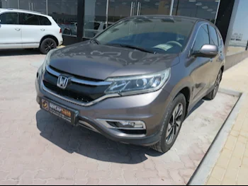 Honda  CRV  2015  Automatic  128,273 Km  4 Cylinder  Front Wheel Drive (FWD)  SUV  Brown