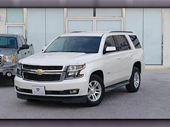 Chevrolet  Tahoe  LT  2015  Automatic  149,000 Km  8 Cylinder  Rear Wheel Drive (RWD)  SUV  White