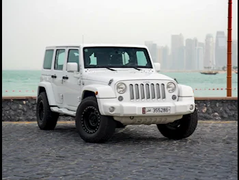 Jeep  Wrangler  Rubicon  2015  Automatic  100,000 Km  6 Cylinder  Four Wheel Drive (4WD)  SUV  White
