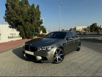 BMW  M-Series  5 Jahre Edition  2015  Automatic  39,500 Km  8 Cylinder  Rear Wheel Drive (RWD)  Sedan  Gray Matte