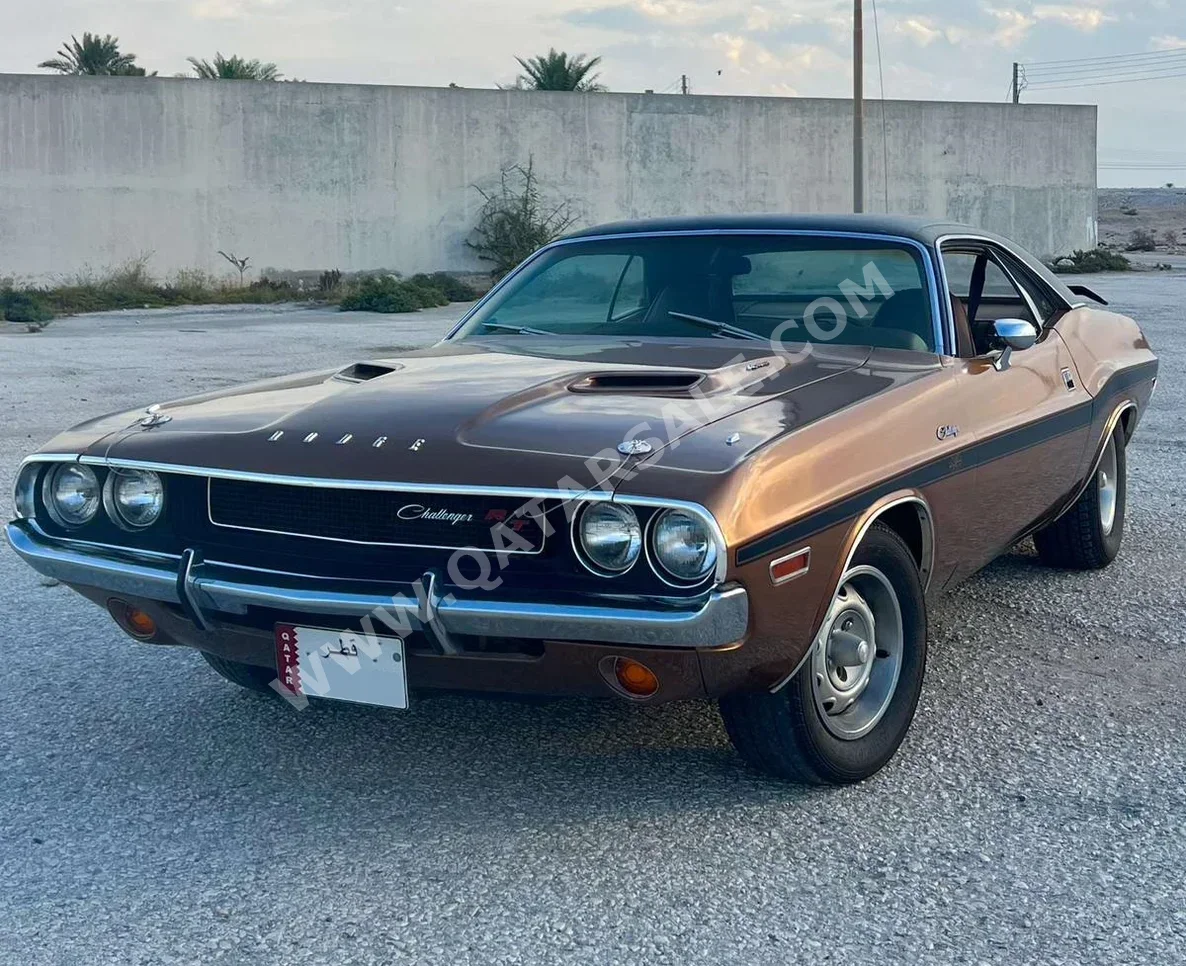 Dodge  Challenger  1970  Automatic  9,999 Km  6 Cylinder  Rear Wheel Drive (RWD)  Coupe / Sport  Brown