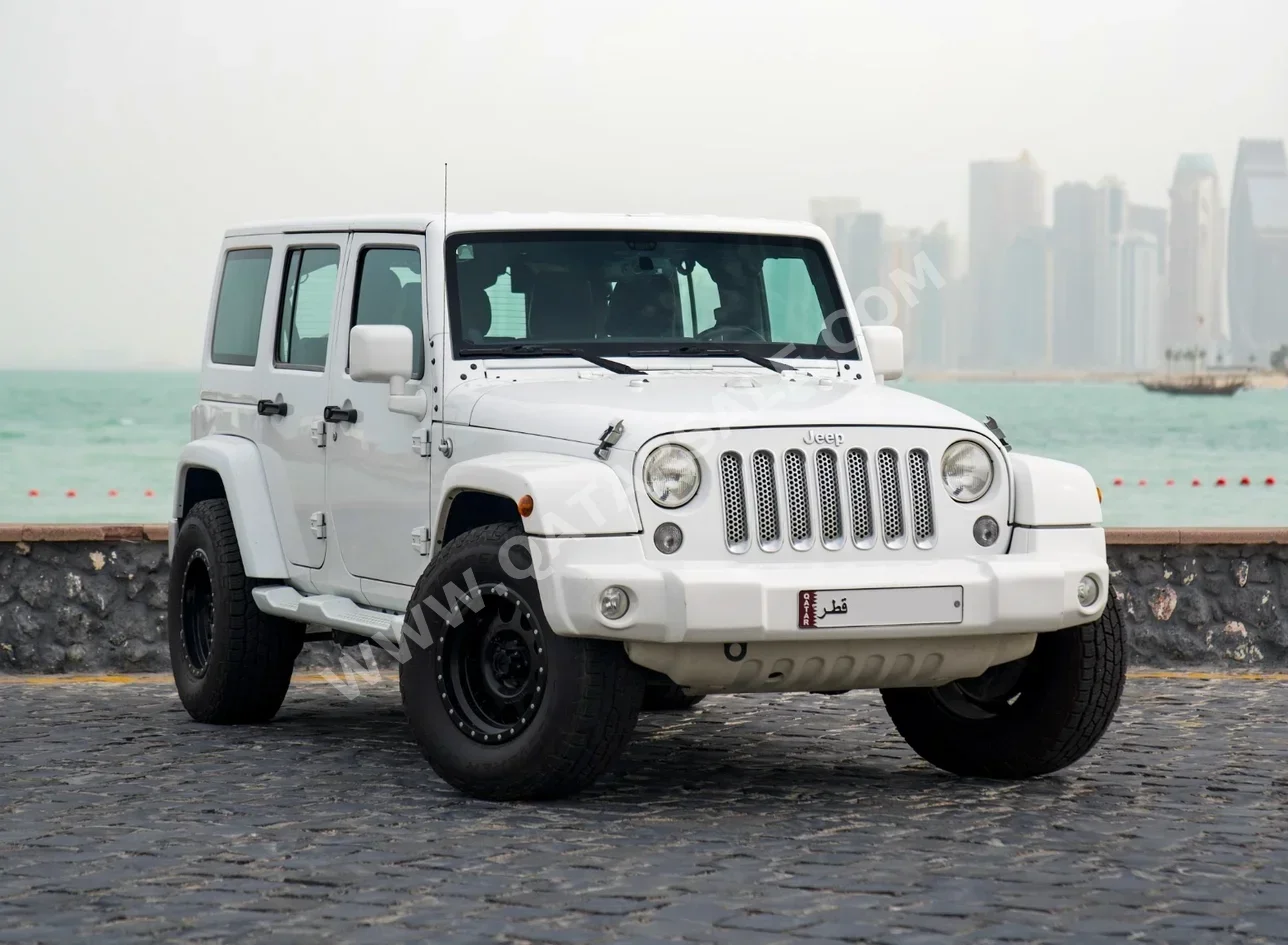 Jeep  Wrangler  Rubicon  2015  Automatic  105,000 Km  6 Cylinder  Four Wheel Drive (4WD)  SUV  White