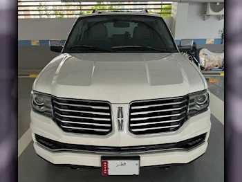 Lincoln  Navigator  2015  Automatic  34,450 Km  6 Cylinder  Four Wheel Drive (4WD)  SUV  White  With Warranty